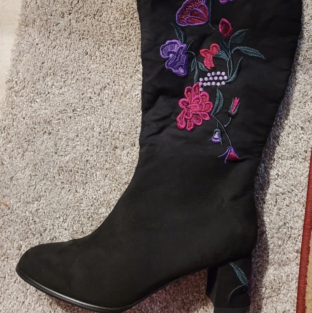 Eloquii floral embroidered thigh high boots.